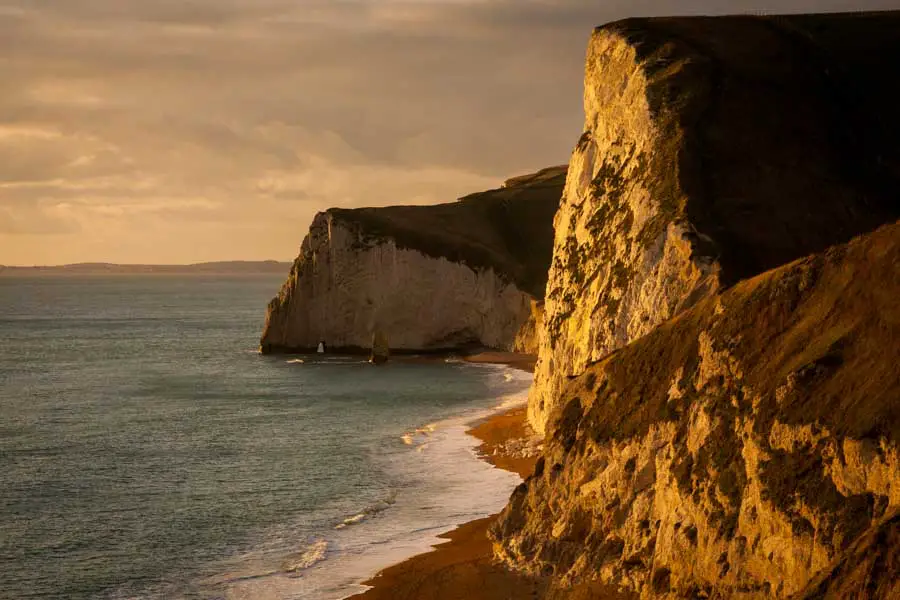 Bats Head Dorset at sunset by Rick McEvoy
