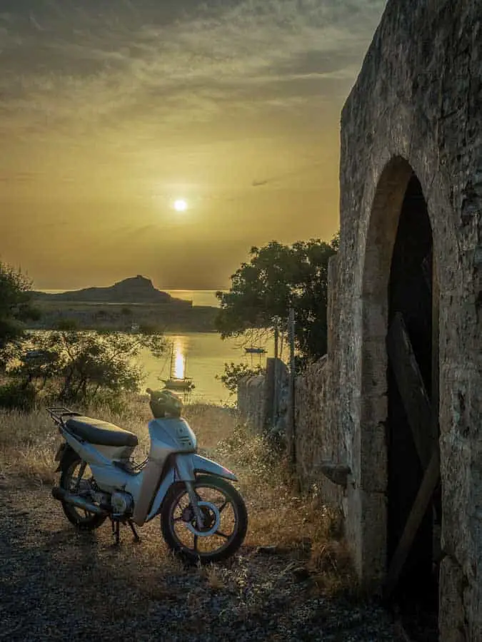Scooter at sunrise in Lindos on the Greek Island of Rhodes