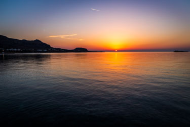 Navarone Bay, Rhodes, Greece at sunrise by Rick McEvoy