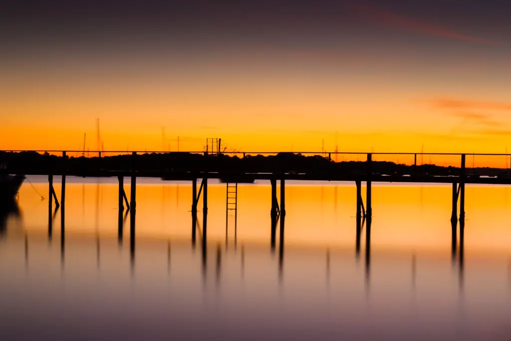 Pier at sunset, Hamworthy, Dorset, England