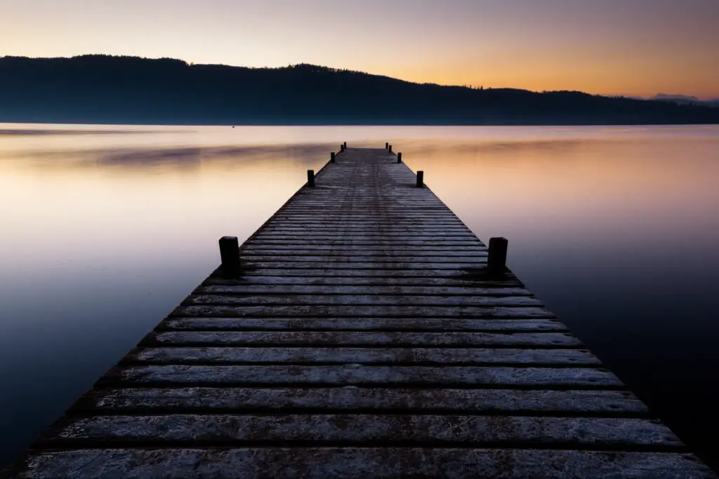 Jetty at sunset, Lake Windermere, Lake District, England