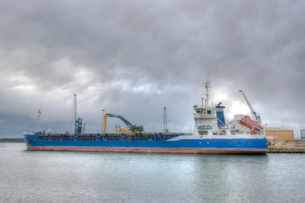 21 - Commercial ship being loaded with materials, Poole Port, Dorset, England